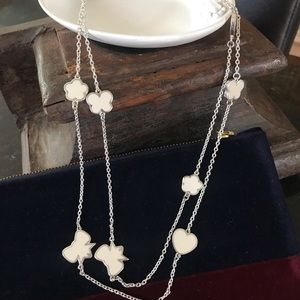 Necklace with white accent charms